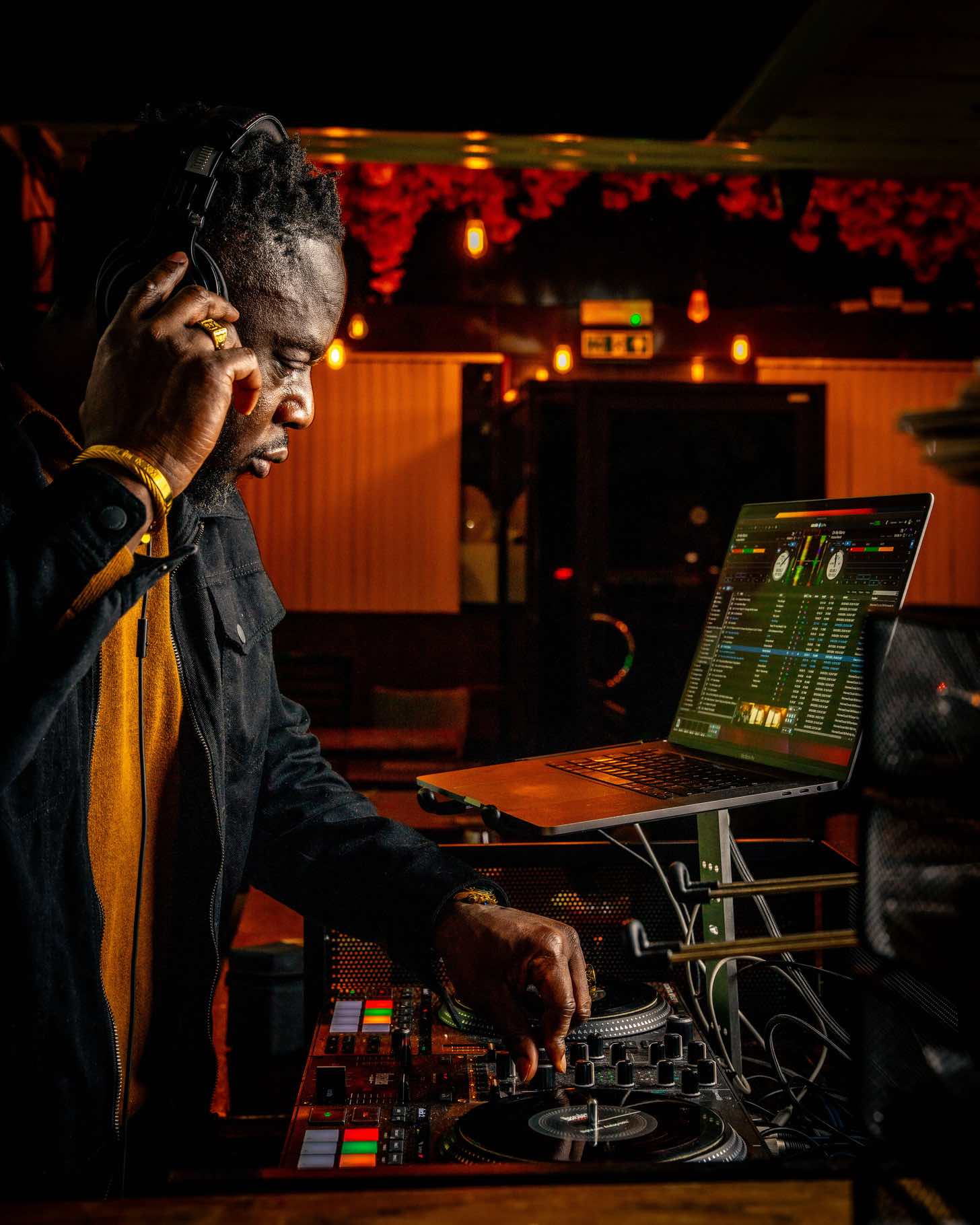 DJ with red lighting